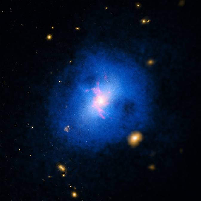 A study of over 200 galaxy clusters, including Abell 2597 shown here, with NASA’s Chandra X-ray Observatory has revealed how an unusual form of cosmic precipitation stifles star formation. Image Credit: NASA/CXC/DSS/Magellan