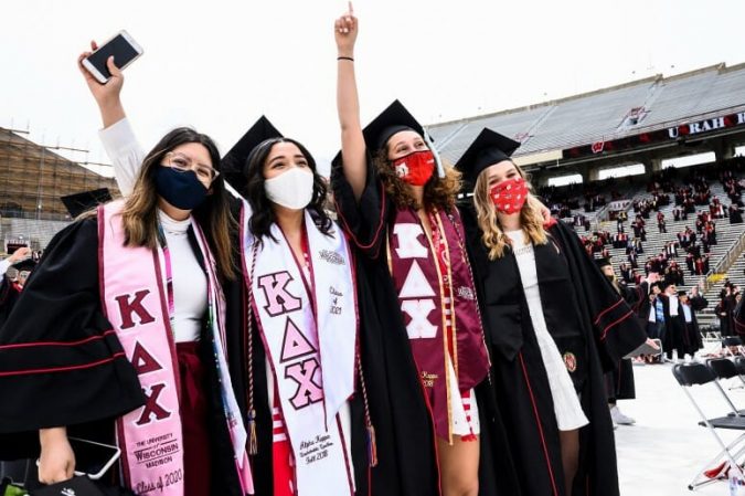 Back where they belong, undergraduate Badgers rock Camp Randall 2 CommenceSpringUG ceremony press