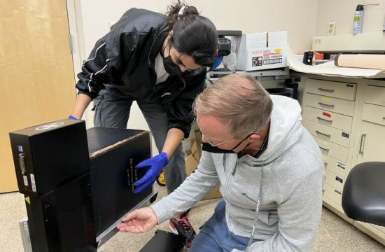 Uwe and I figuring out how to best mount the Gutenberg bible in the beamlin