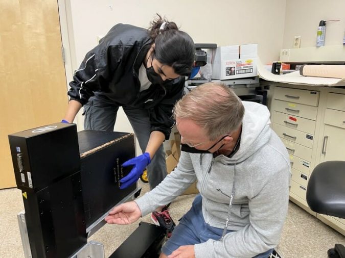 Uwe and I figuring out how to best mount the Gutenberg bible in the beamlin