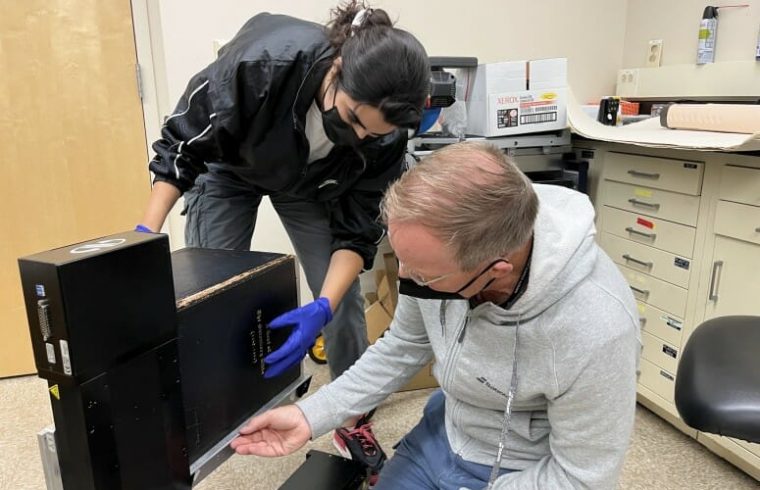 Uwe and I figuring out how to best mount the Gutenberg bible in the beamlin