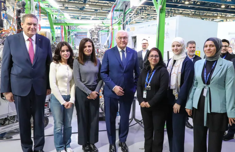 Frank walter steinmeier and khaed Toukan with scientists